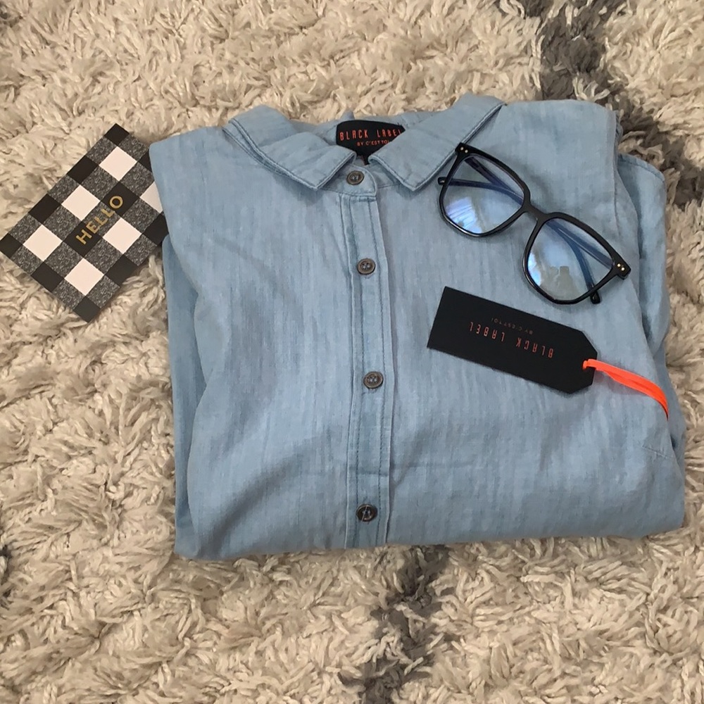 Light denim like button down blouse with puff shoulders